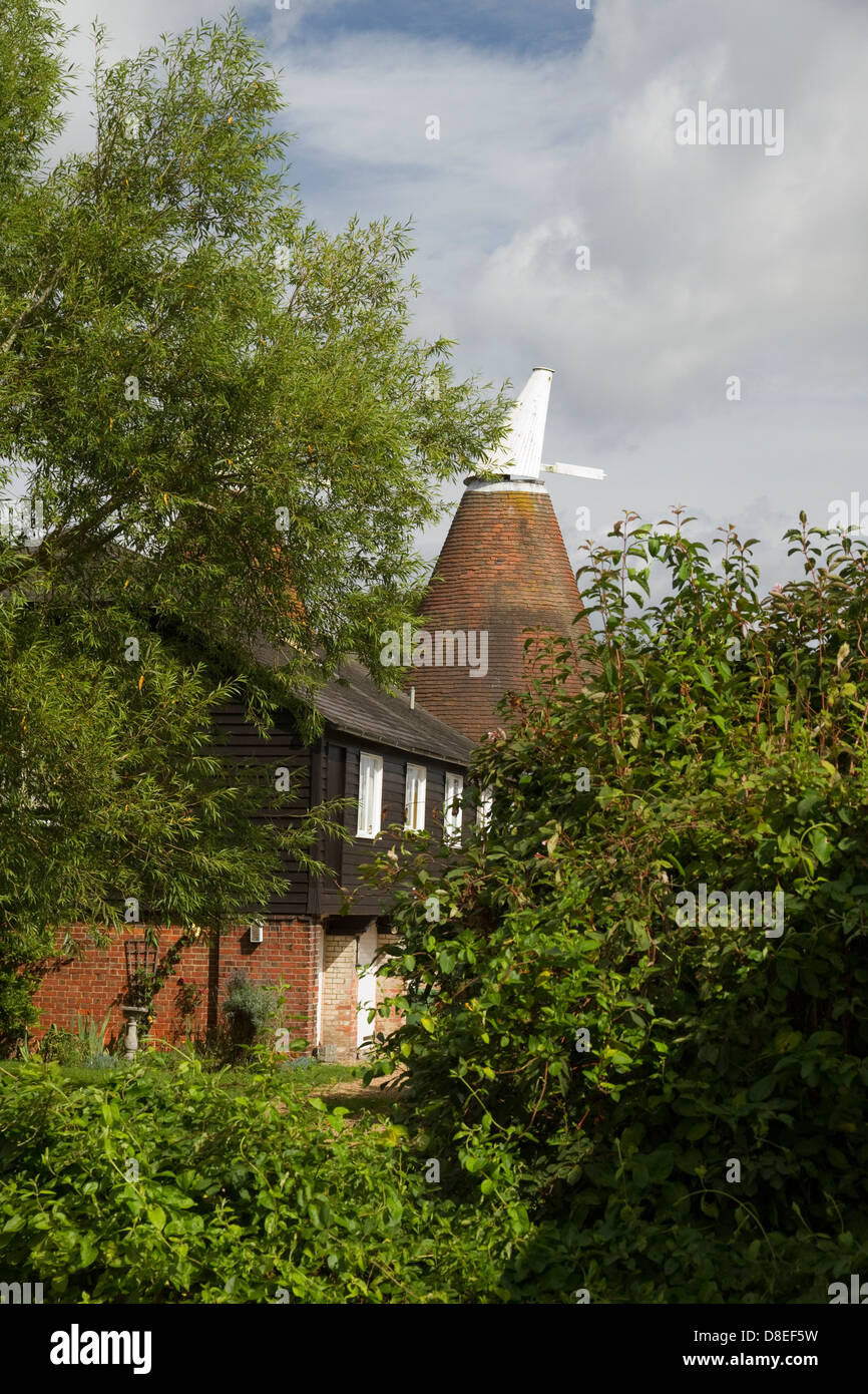 Converted oast houses in Kent England Stock Photo Alamy