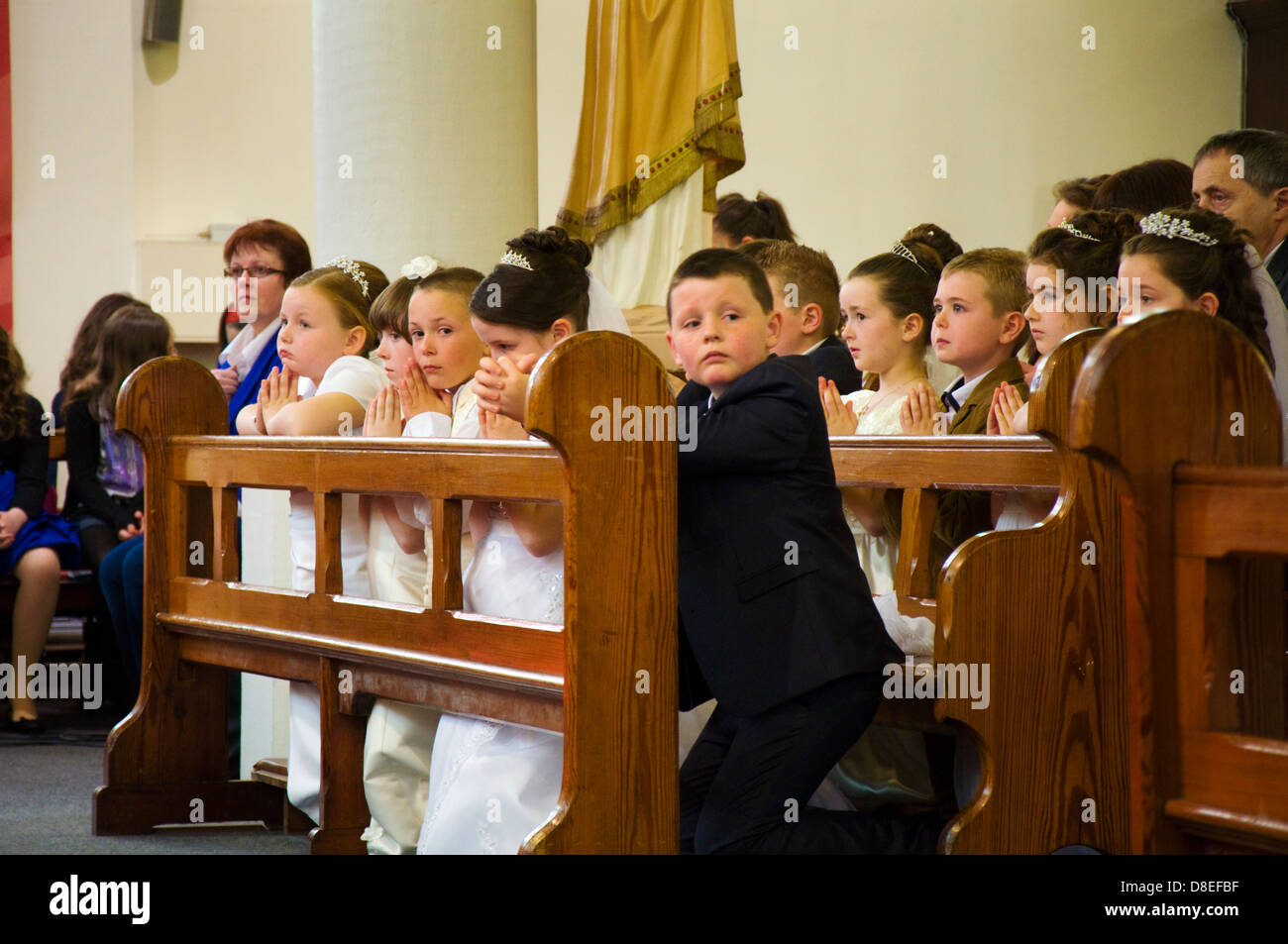 Children at a First Communion Mass Stock Photo - Alamy