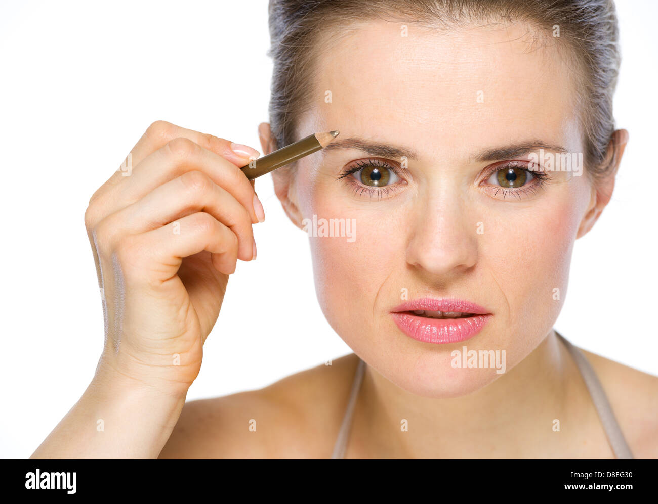 Applying eye liner hi-res stock photography and images - Alamy