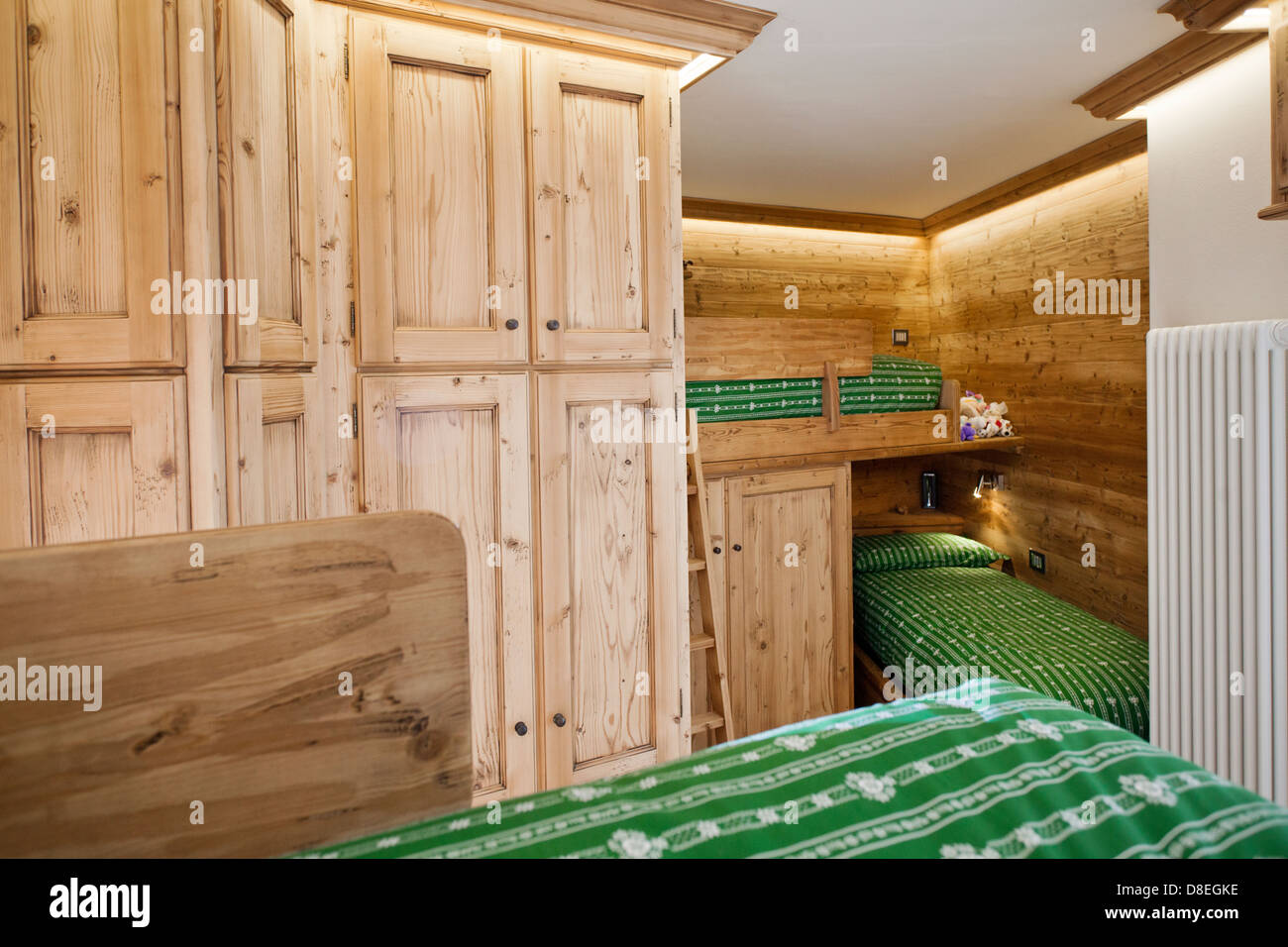Kid's room in alpine cottage made out of pine wood Stock Photo