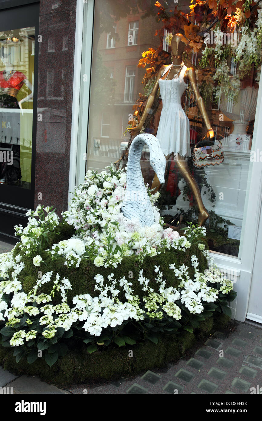 floral pavement display and window of Brown's Sloane Street shop, London during the RHS Chelsea Flower Show, 2013 Stock Photo