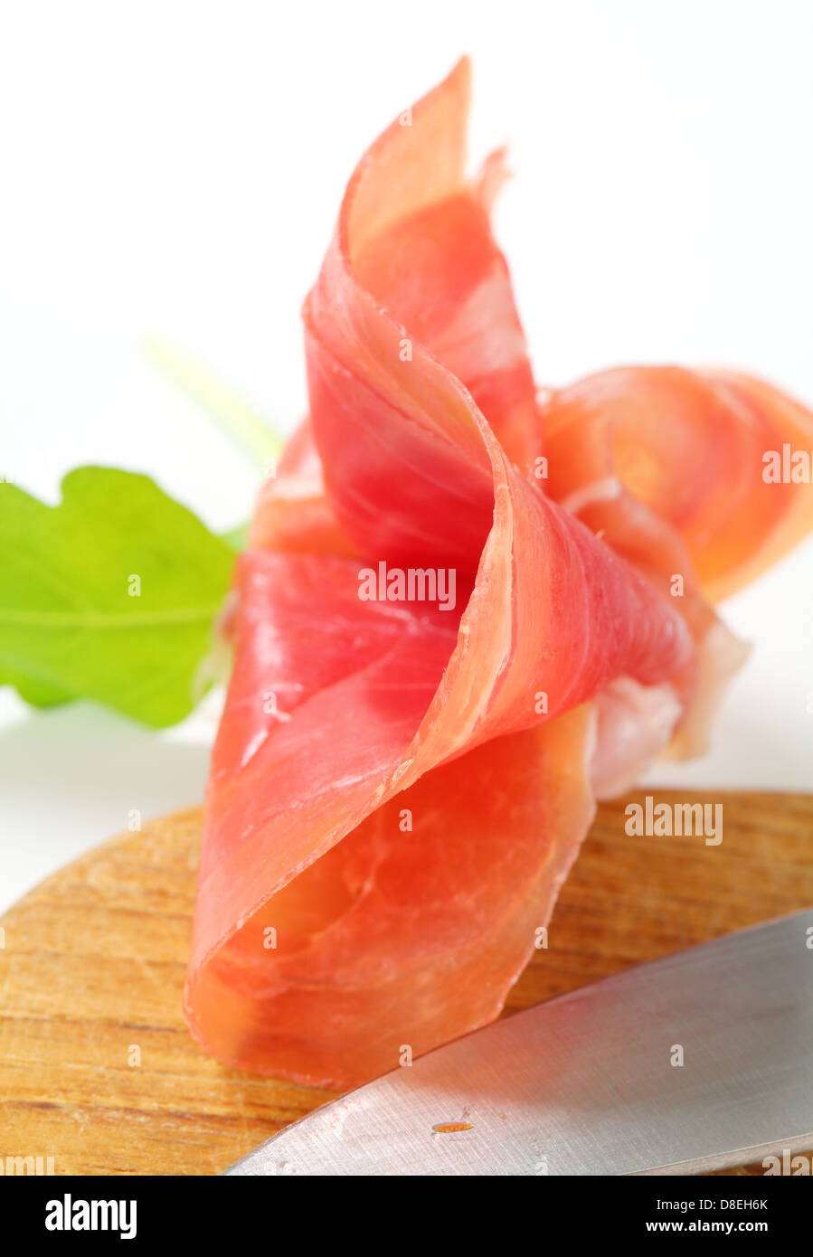 Thin slice of dry cured smoked ham Stock Photo Alamy