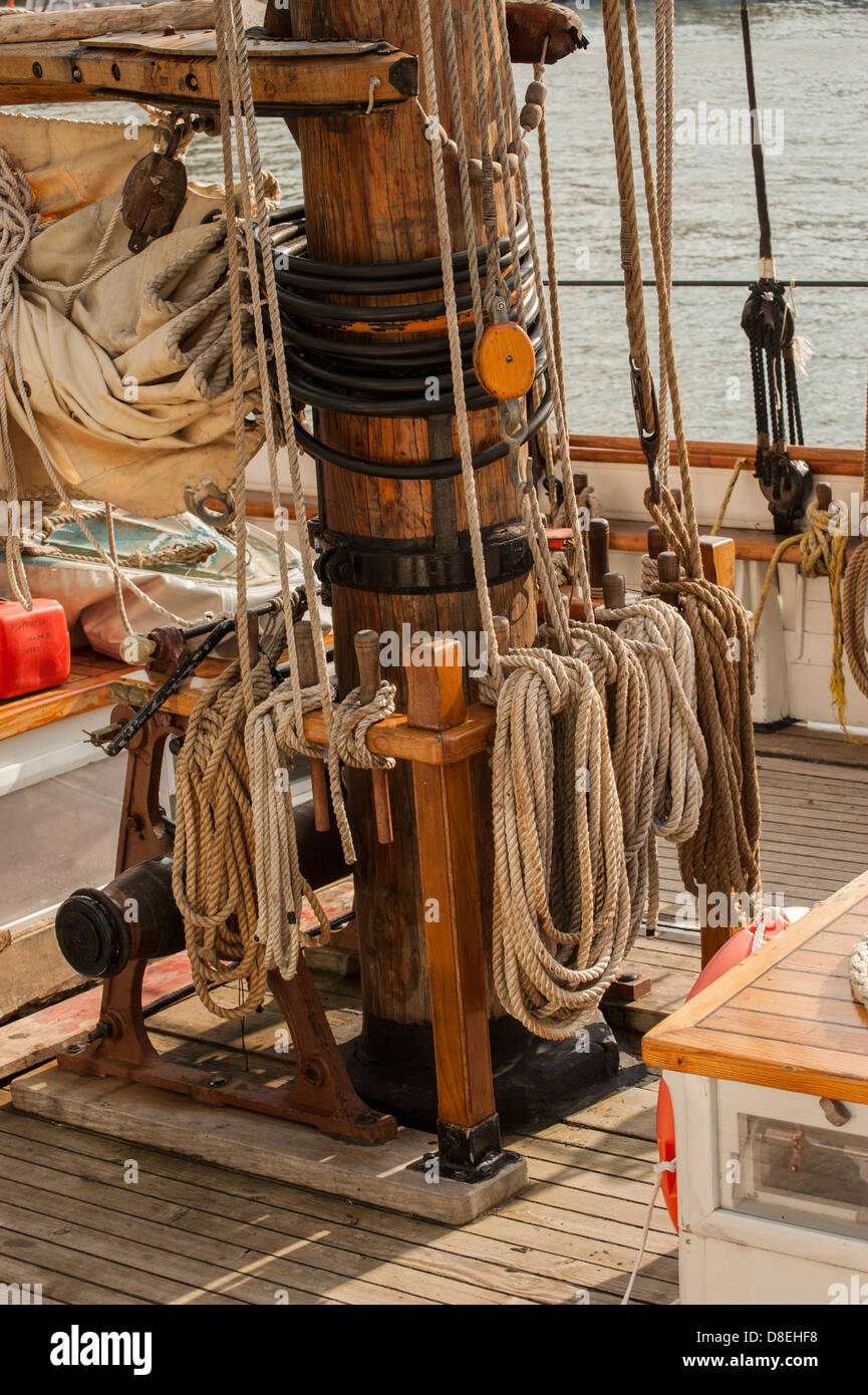 Stowing the ropes on a tall-masted sailing ship Stock Photo - Alamy