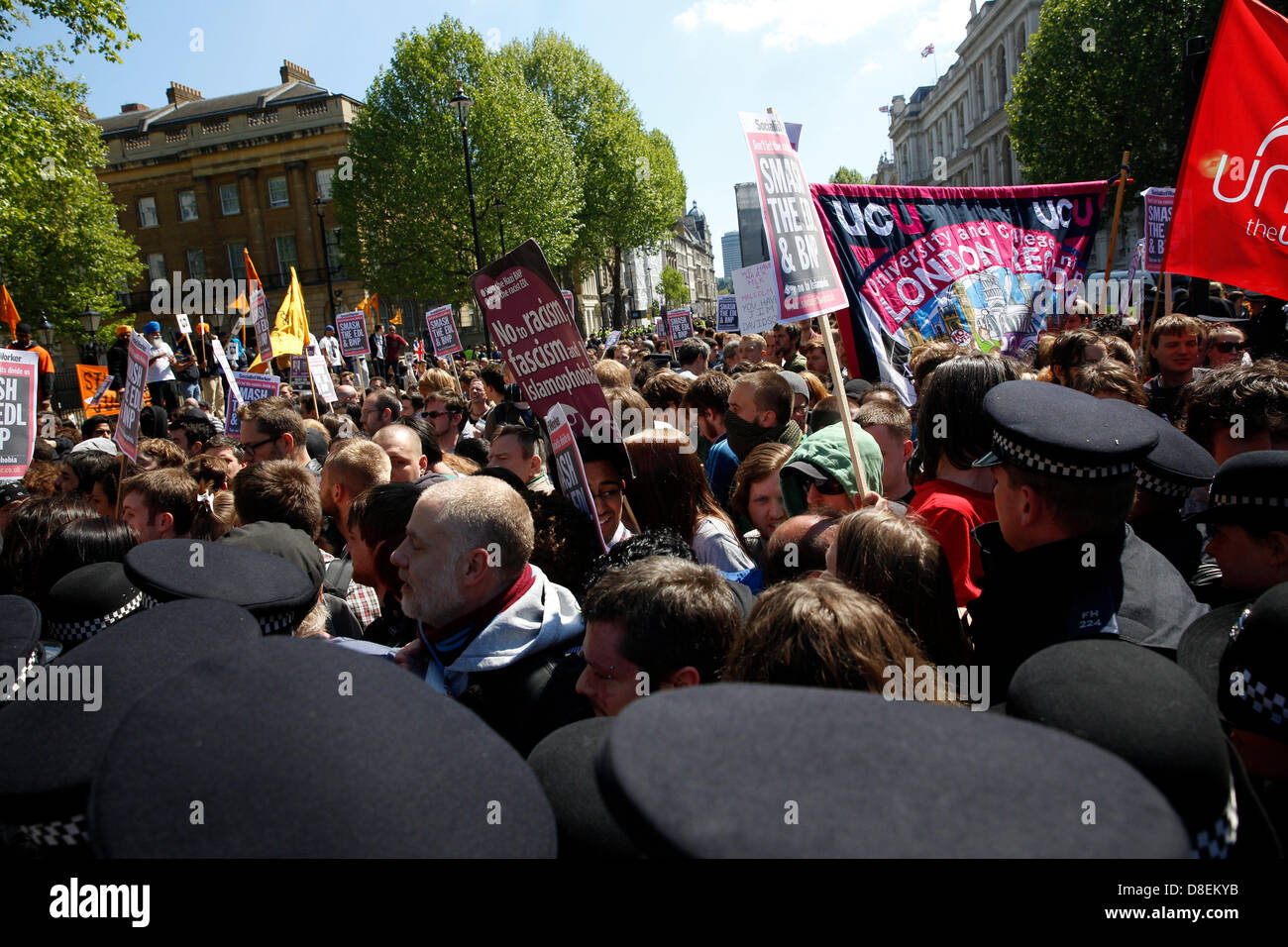 London, UK. 27th May, 2013. EDL marched to Downing street under strict police supervision while the UAF were holding a counter protest. some minor clashes with the police as UAF people tries to break through the police line Credit: Lydia Pagoni/Alamy Live News Stock Photo