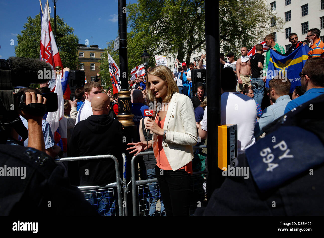 London, UK. 27th May, 2013. EDL marched to Downing street under strict police supervision while the UAF were holding a counter protest. Media outlets were attending in heavy numbers. Credit: Lydia Pagoni/Alamy Live News Stock Photo