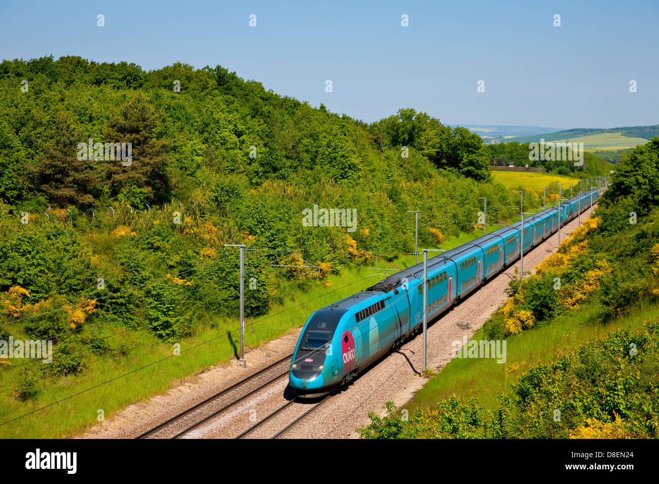 TGV Ouigo ( French high-speed rail service low cost ) in the LGV Sud-Est near Sens, France Stock Photo