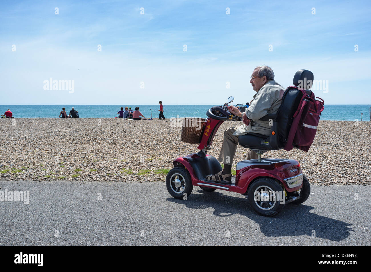 An elderly man on a mobility scooter on Worthing Seafront. Picture by Julie Edwards Stock Photo