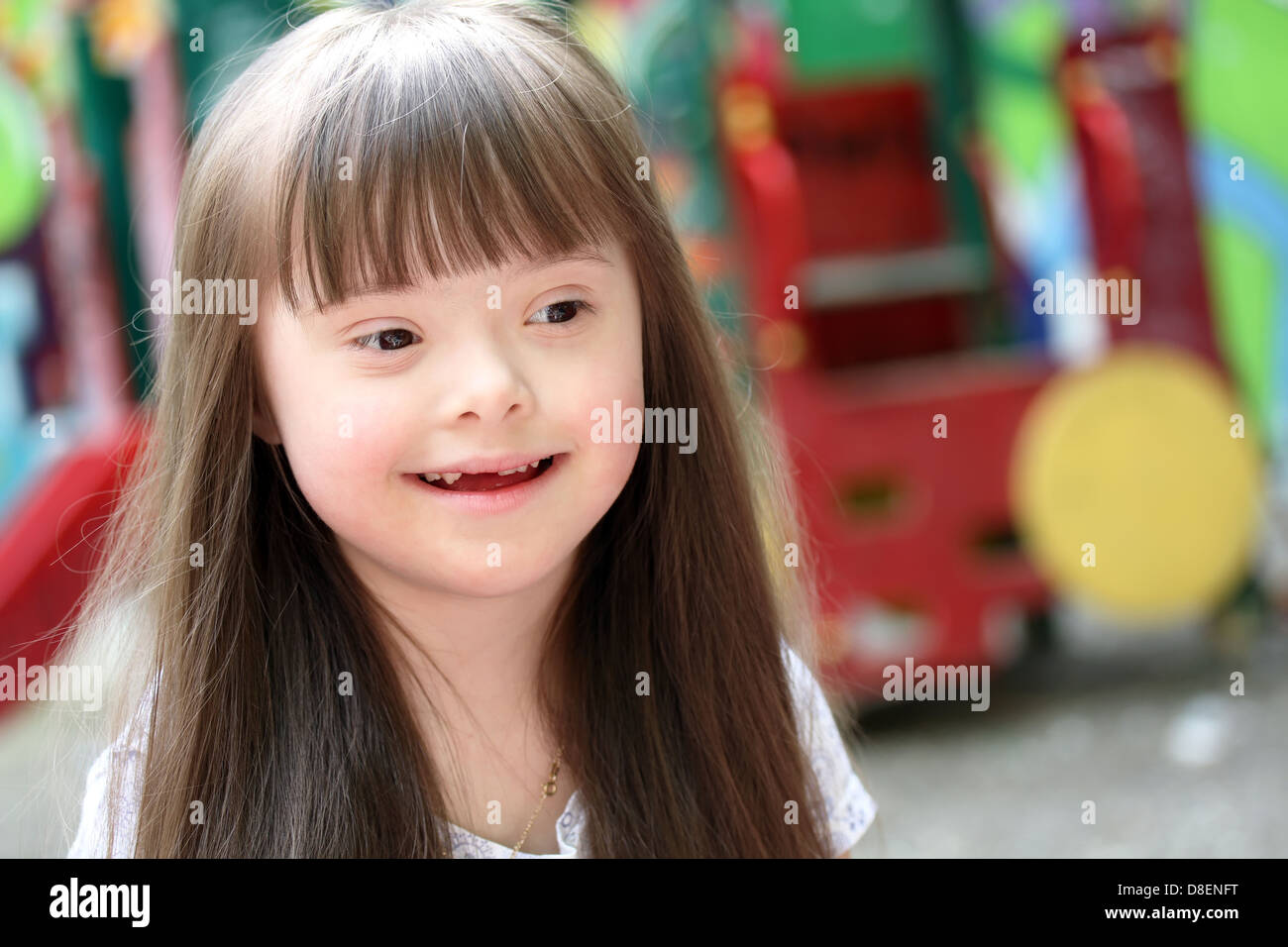 Portrait of beautiful young girl on the playground Stock Photo - Alamy