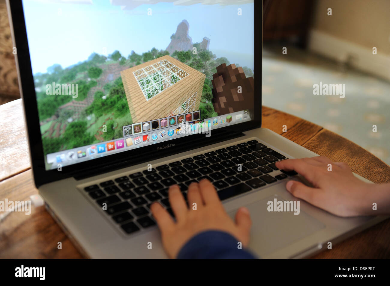 An 8 Year Old Boy Playing Minecraft On His Computer Apple Ipad In His Bedroom At Home Stock Photo Alamy An 8 Year Old Boy Playing Minecraft On His Computer Apple Ipad In His Bedroom At Home Stock Photo Alamy