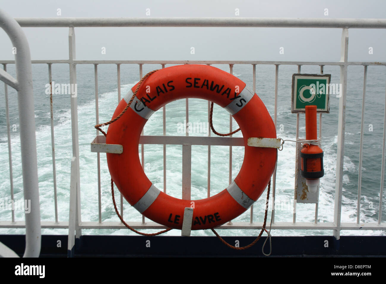 Rubber ring buoy on a ferry boat. Stock Photo
