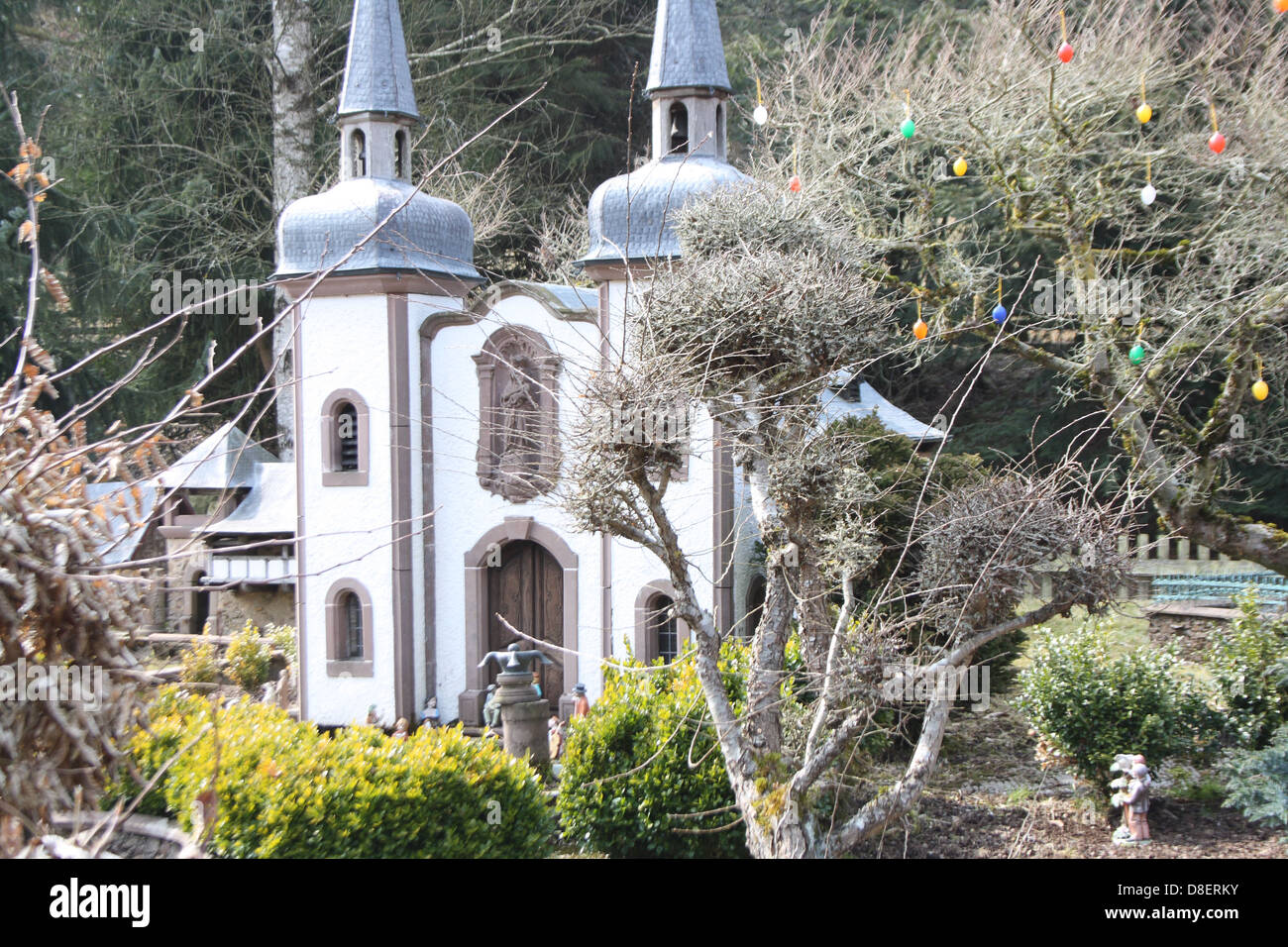 A church in a model village. Stock Photo