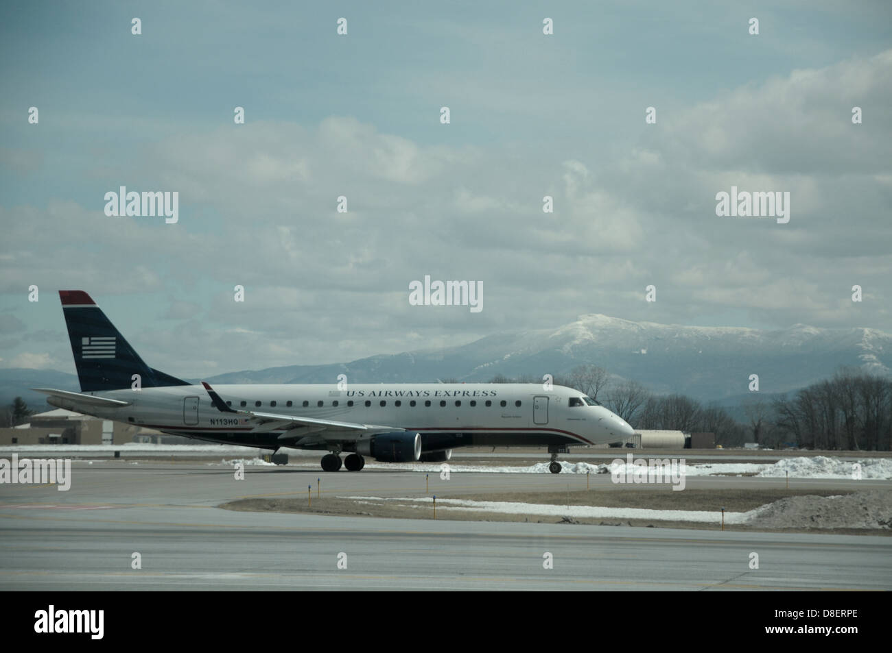 A U.S. Airways airplane taxies enroute to the gate at Burlington International Airport in Burlington, Vermont. Stock Photo