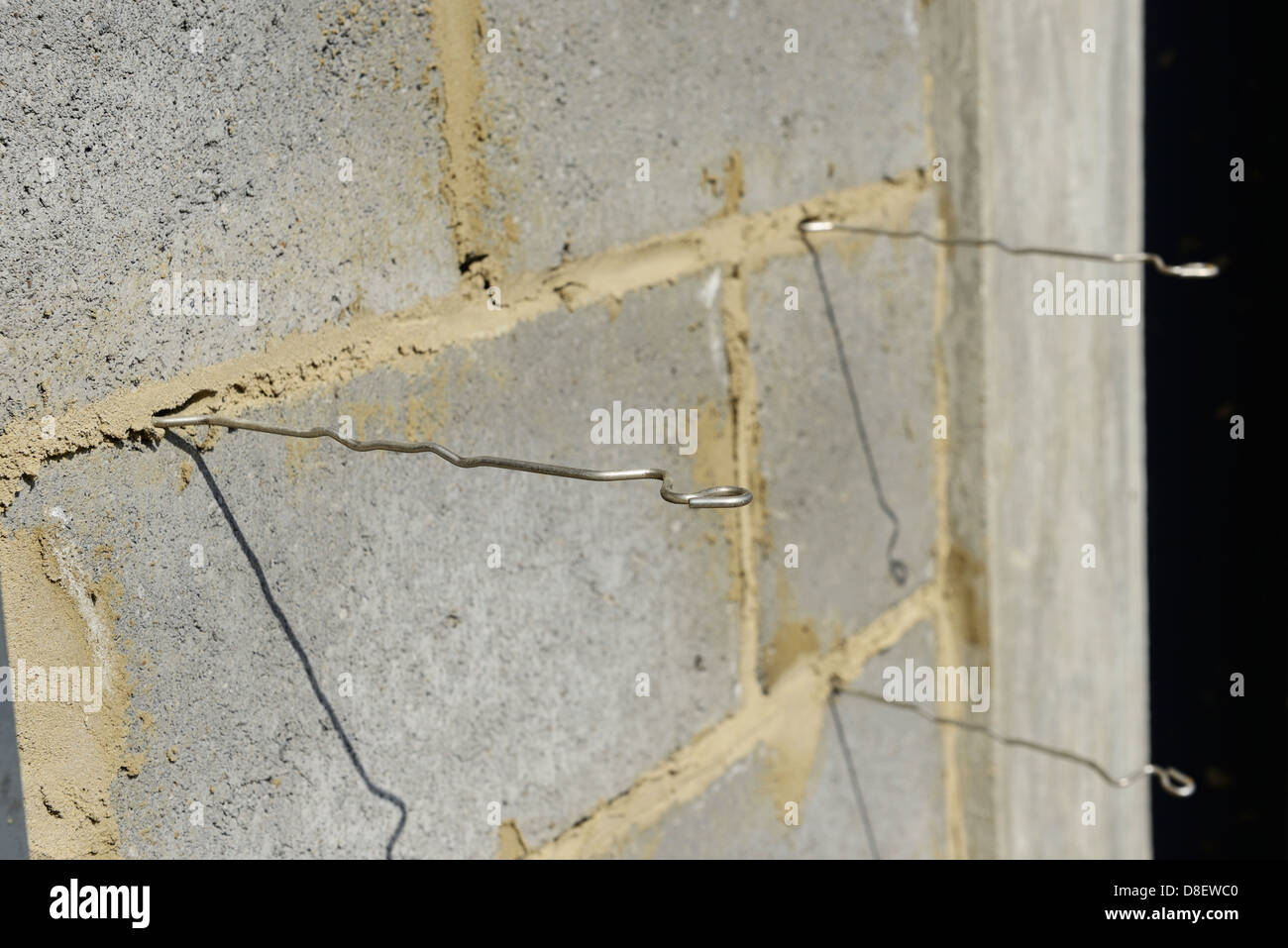 Metal brick wall ties Stock Photo