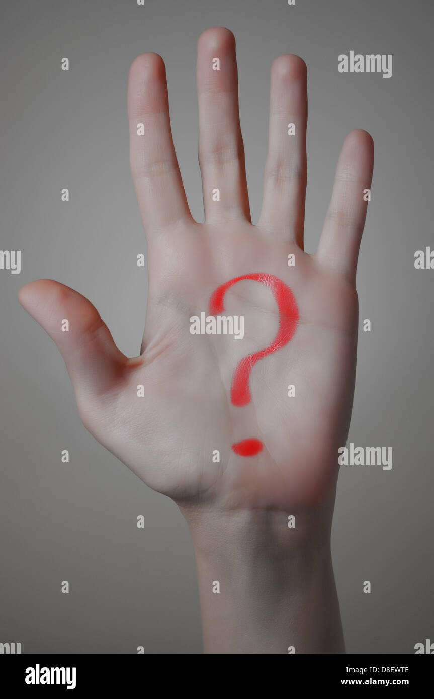 Red Question Mark on a Hand Stock Photo
