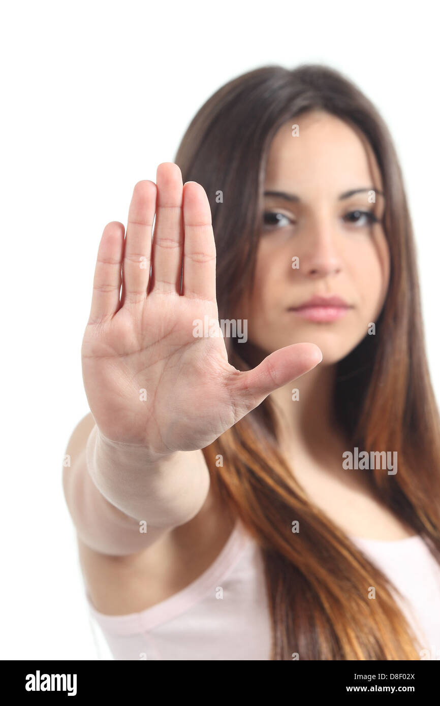 Pretty teenager girl making stop gesture with her hand isolated on a white background Stock Photo