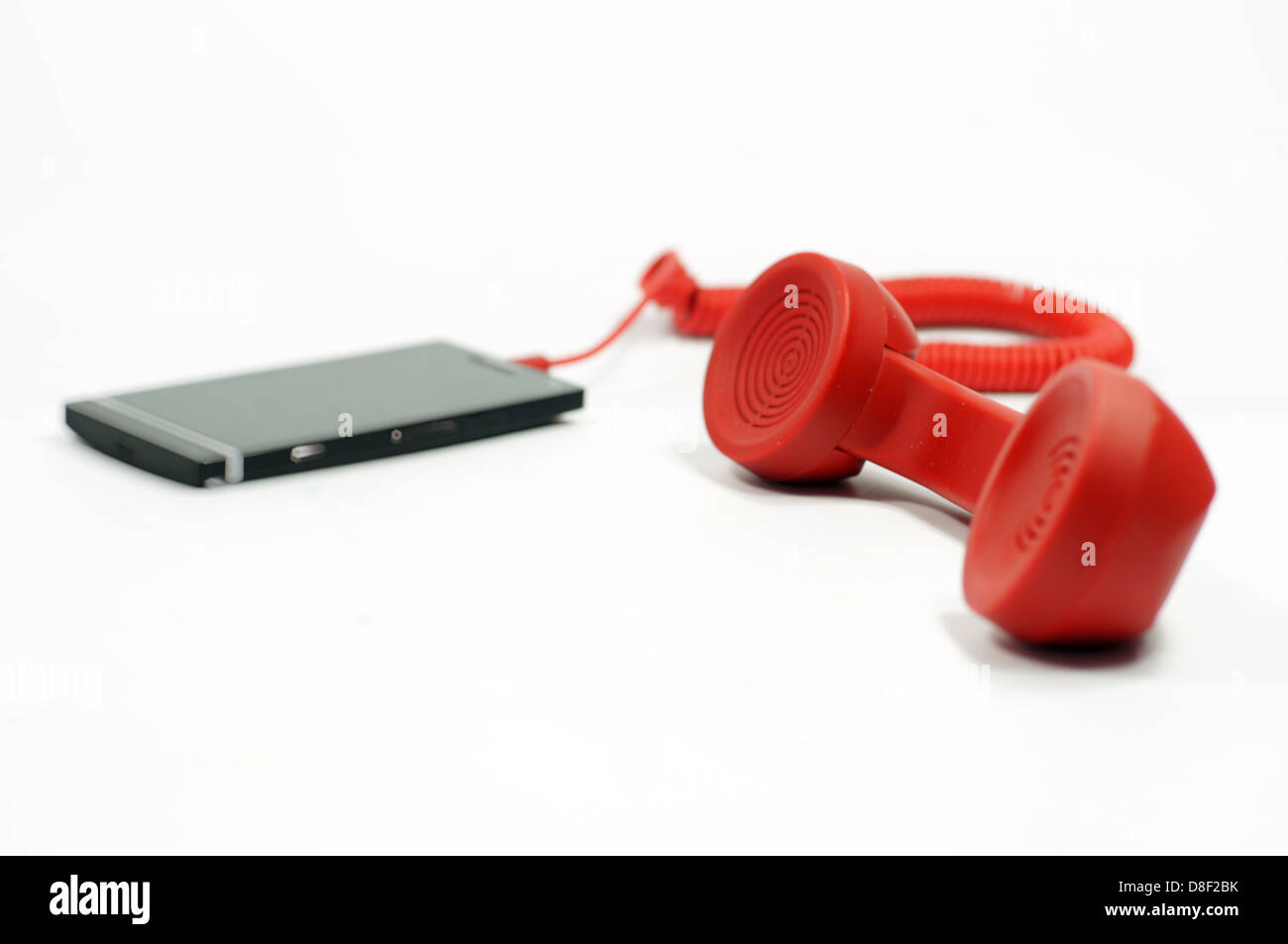 Mobile phone with a retro classic extension handset Stock Photo Alamy