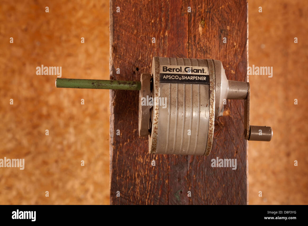 An old pencil sharpener in a rustic shed. Stock Photo