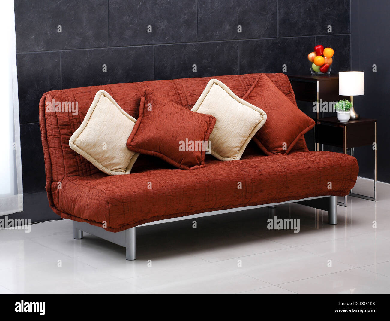 A luxury comfortable sofa bed and cute cushions Stock Photo