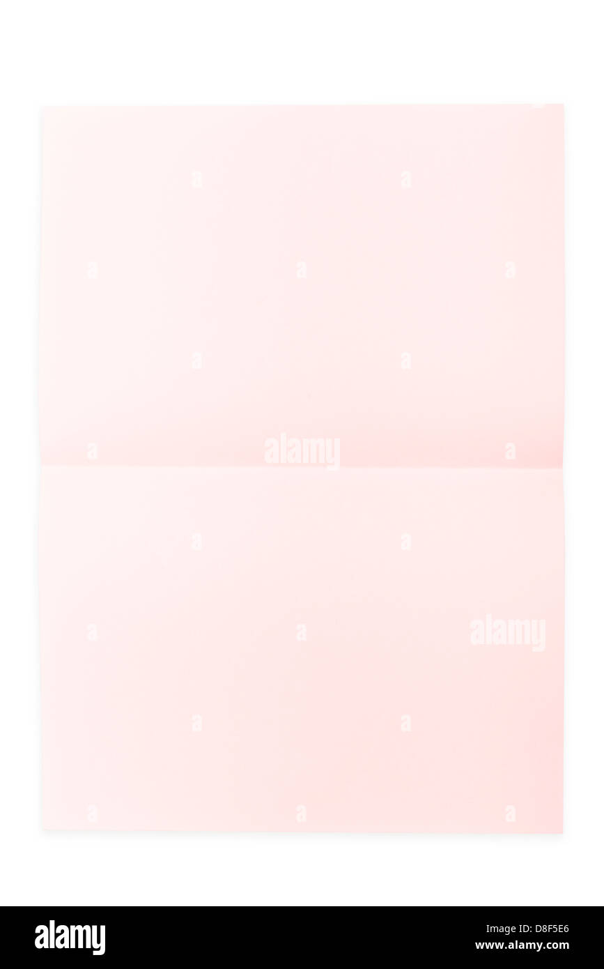 Pink paper sheet folded in half isolated over a white background Stock Photo Alamy