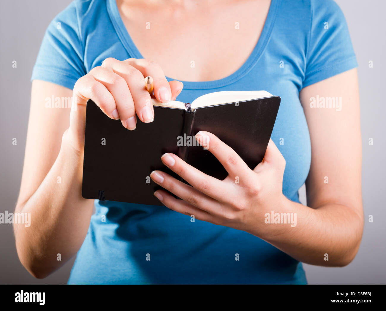 Black child writing with pencil hi-res stock photography and images - Alamy