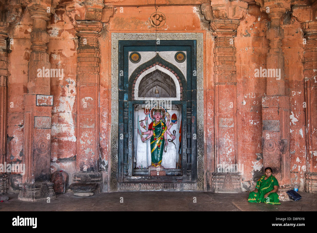 Hindu shrine inside the Mihrab of an old mosque, Daulatabad Fort, Daulatabad, India Stock Photo