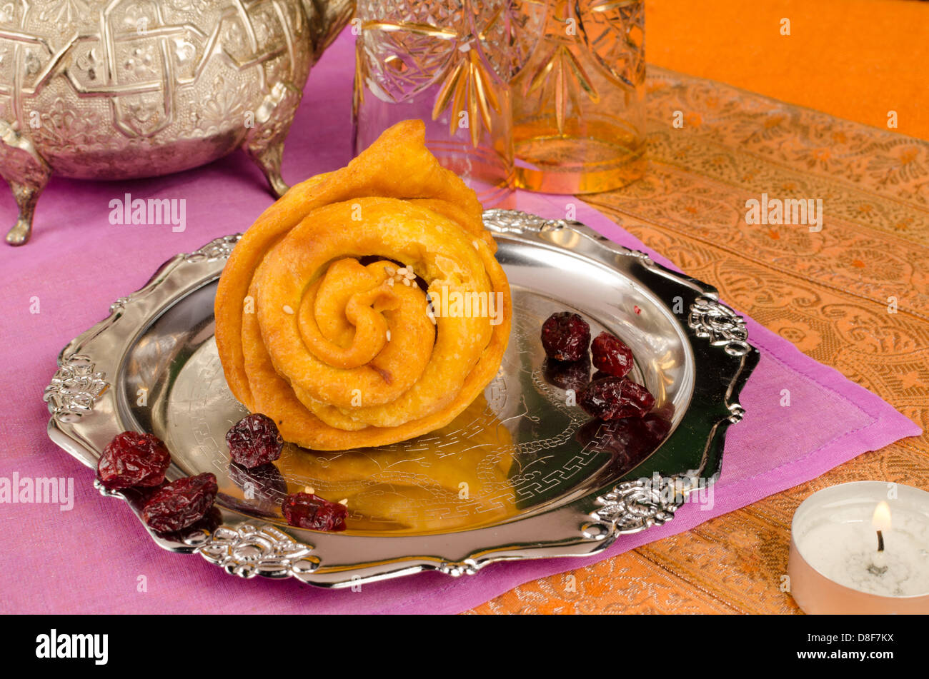 A flower shaped shebakia in an Arabic still life Stock Photo - Alamy