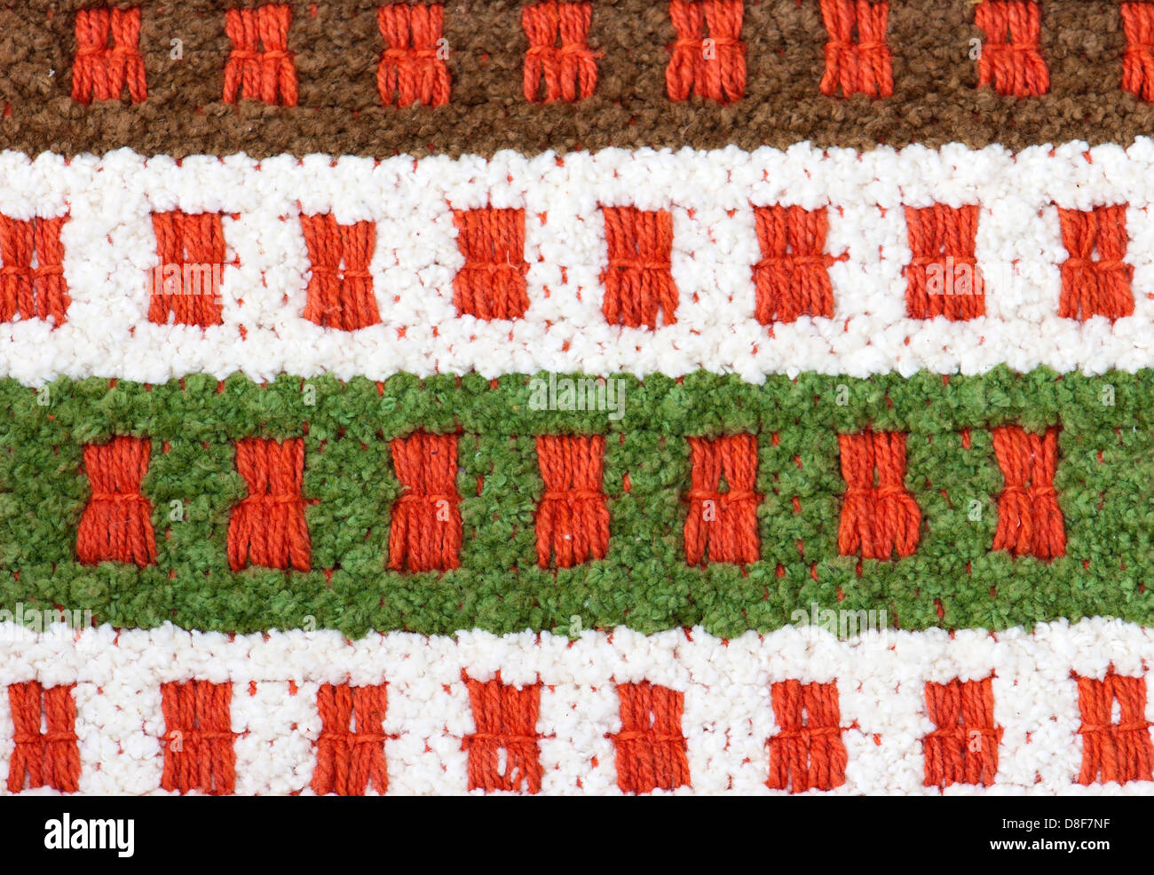 Hand woven carpet with abstract pattern. Stock Photo