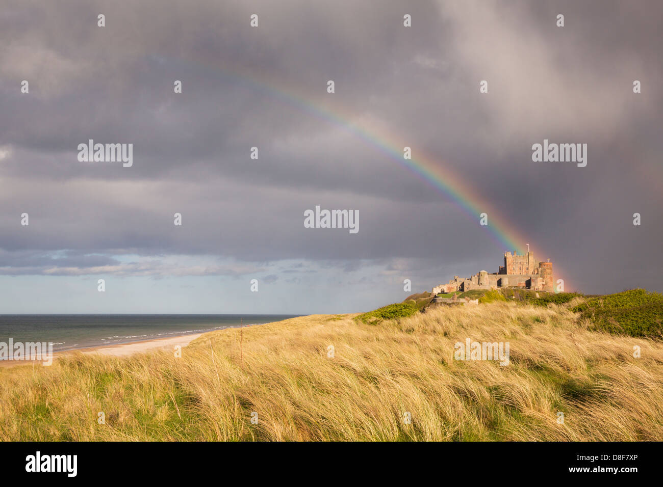 Rainbow over Bamburgh Castle, Northumberland Stock Photo