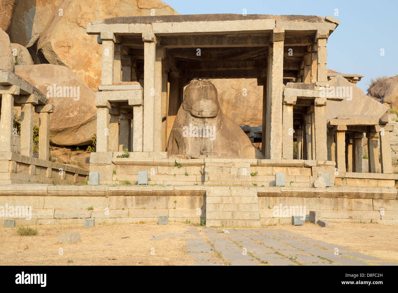 Monolithic Nandi staue and shrine, Hampi, India Stock Photo