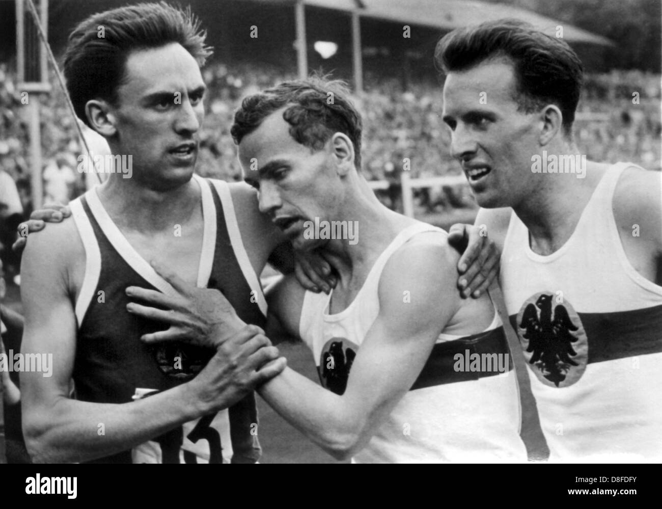 GDR athletes (L-R) Manfred Matuschewski, Paul Schmidt and Joerg Balke pictured in Erfurt, GDR, 07 August 1960. Stock Photo