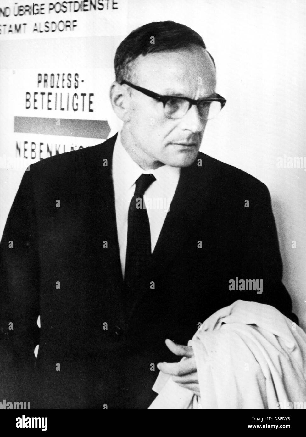 Hamburg-based human geneticist Professor Widukind Lenz enters the courtroom in Alsdorf, Germany, 12 August 1968. He was called upon by the court to serve as an expert on the sleeping drug Contergan. At an early stage Lenz had warned against the use of Contergan and had prompted Contergan-maker Grünenthal to withdraw the drug because he speculated that it could cause deformities in unborn children. The trial against seven high ranking employees of the Stollberg-based Grünenthal company, makers of the drug Contergan, began on 27 May 1968 in the miner's canteen 'Anna' in Alsdorf near Aachen, Germ Stock Photo
