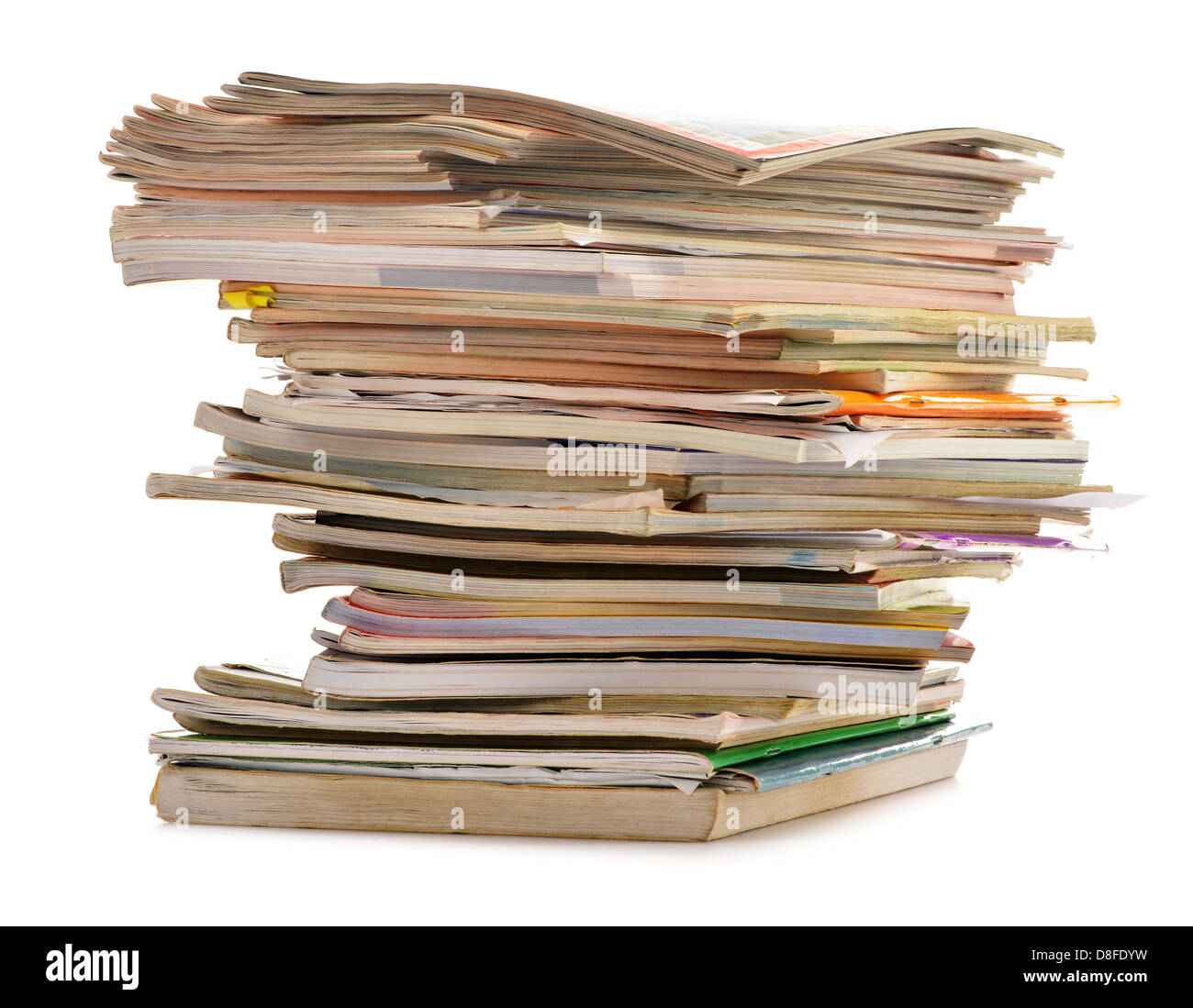 Stack of old magazines isolated on white. Paper recycling Stock Photo