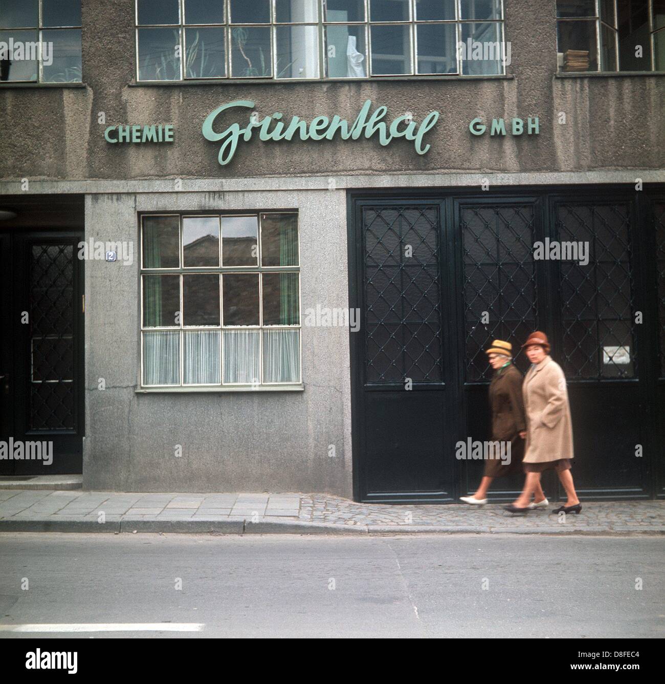 Pedestrians in front of the entrance of Grünenthal GmbH in Stolberg near Aachen (picture from the end of the 1960s). Grünenthal produces the sleeping pill Contergan. The intake of Contergang during pregnancy caused the malformation of 8,000 to 12,000 children, many died. Stock Photo