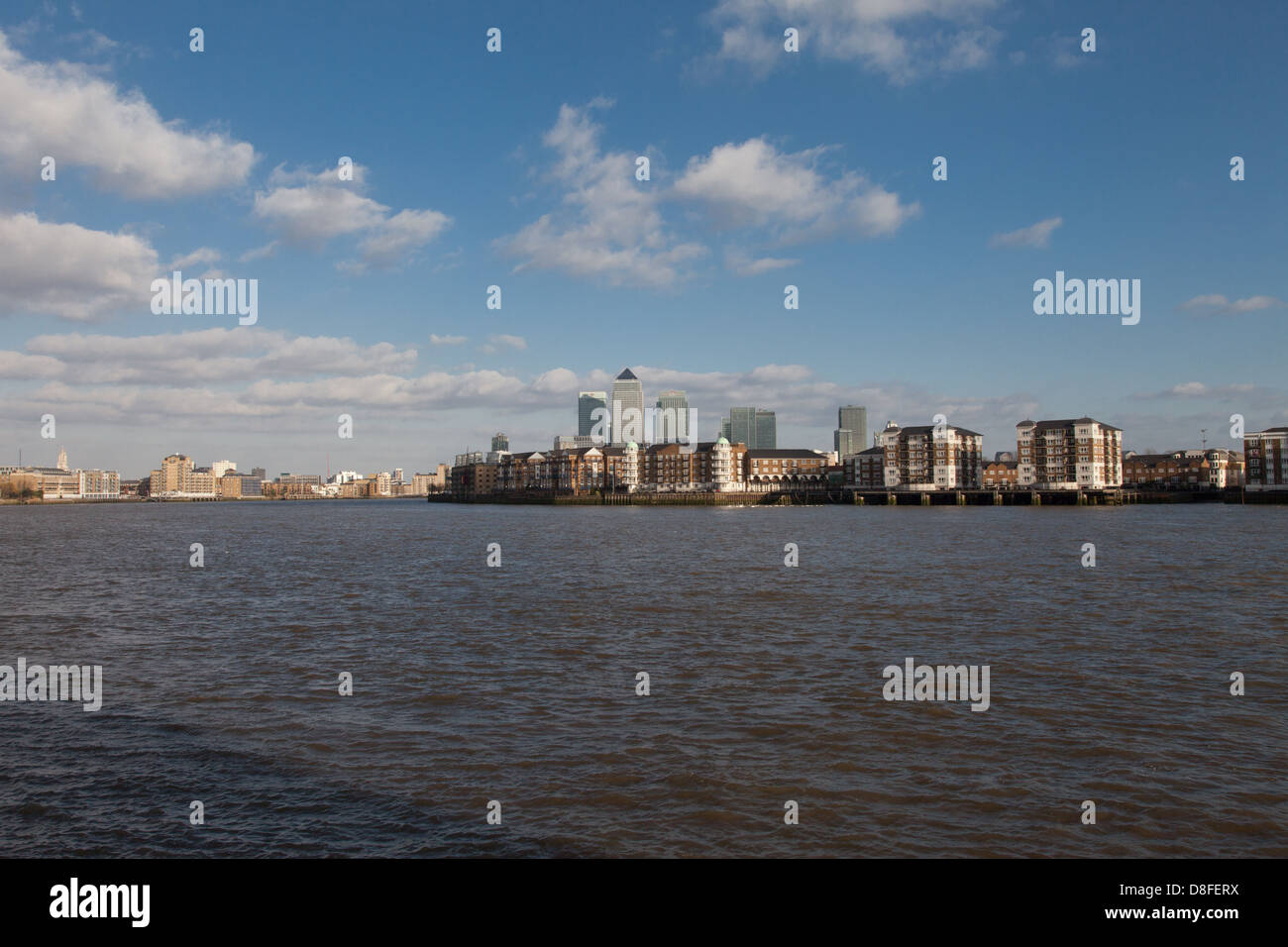 View from Shadwell across Thames of Canary Wharf financial district Stock Photo