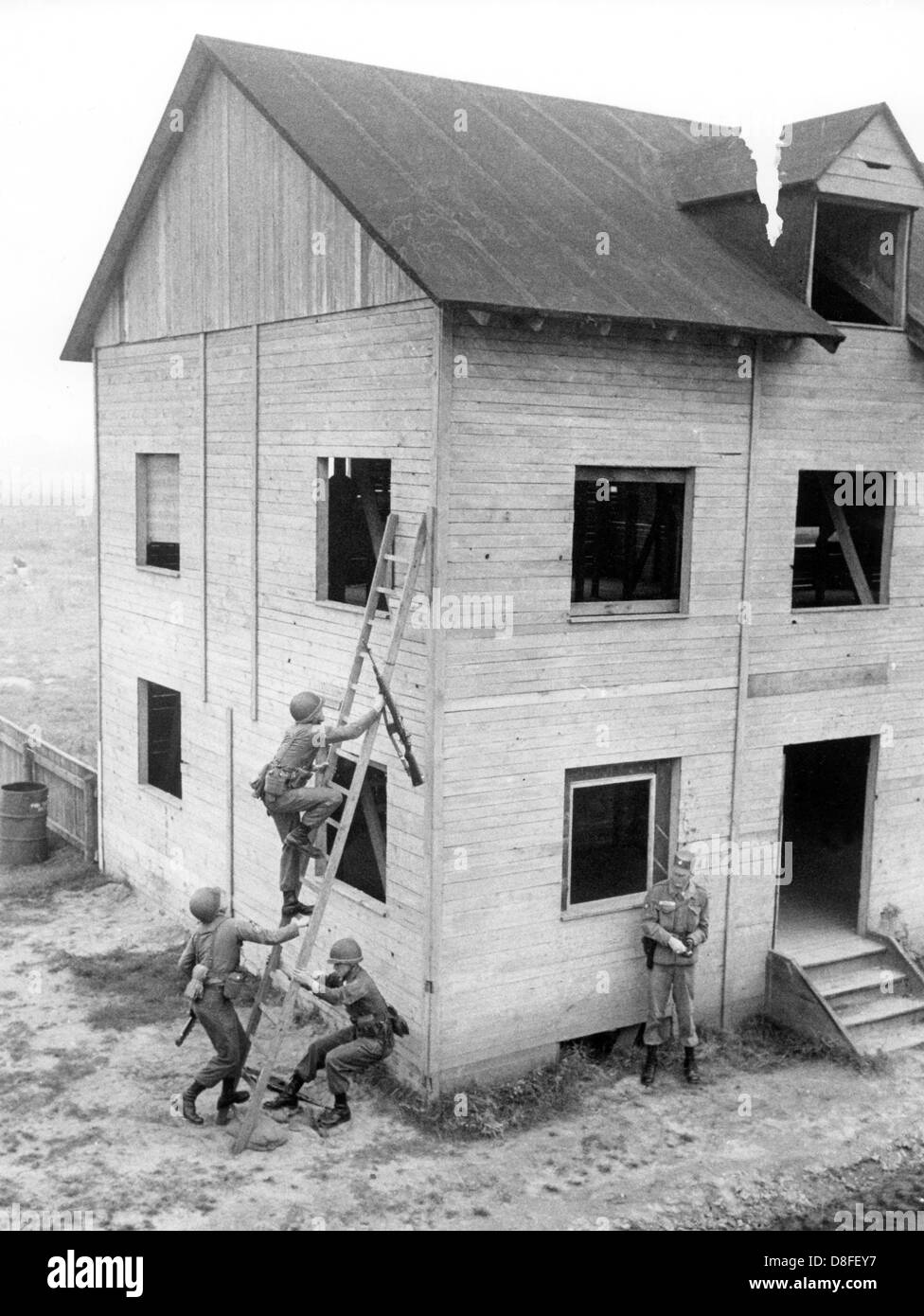 Soldiers of the US army during an exercise on the 11th of October in 1962 in the ghost village 'Parks Range' in Berlin-Lichterfelde, which was especially built for army training. Stock Photo