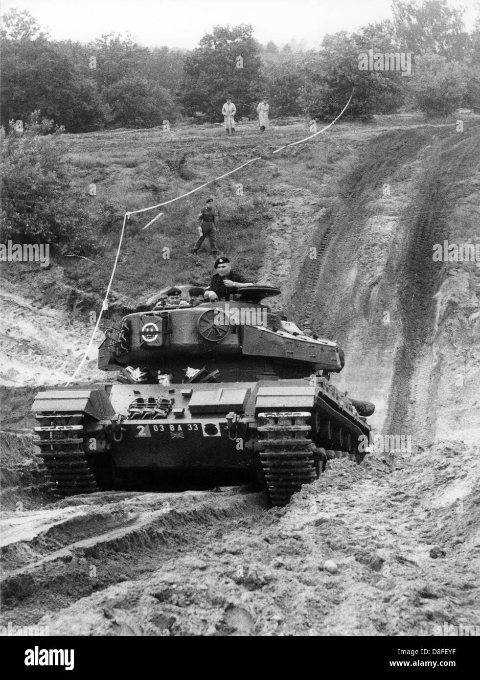 A Centurion tank of the British Army during an allied tank exercise on 13th June 1961 in the Grunewald in Berlin. The exercise was part of an allied tank maneuver where troops and vehicles of the American, the French, and the British forces took part at. Stock Photo