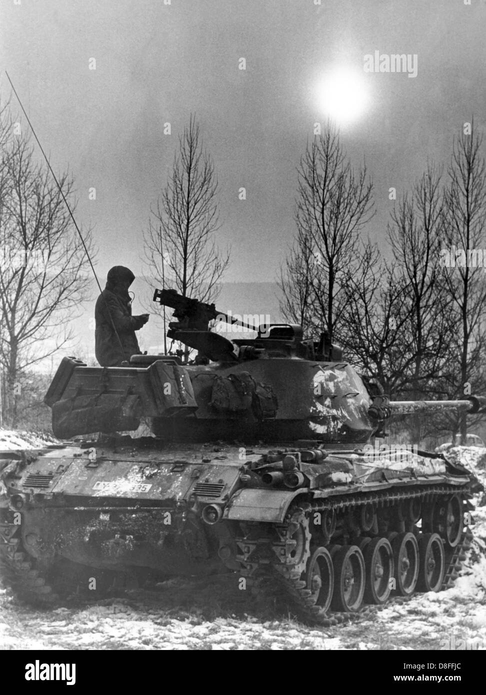A tank of the German armed forces on a cold winter morning on the 12th of January in 1966. The tank and his crew participated in the German-American manoeuvre 'Silberkralle', in which 22,000 soldiers of the 3rd US tank division and 3,000 German soldiers of the 15th tank brigade Koblenz were involved. Stock Photo