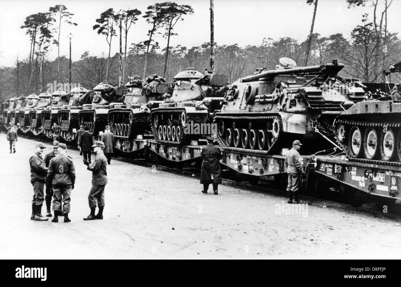 Special trains with 27 heavy tanks, 83 armoured personnel carriers and 170 lorries of the US army shortly before the departure from Kaiserslautern-Vogelweh on 20 January 1969. They are planned for the participation in the manoeuvre 'REFORGER I' - 'Return of Forces to Germany'. Altogether around 17.000 soldiers participated in the manoeuvre, many of them were brought from the USA to Germany via air bridge. The equipment of the soldiers and the heavy tools have already been in depots in Germany for the most part. Stock Photo