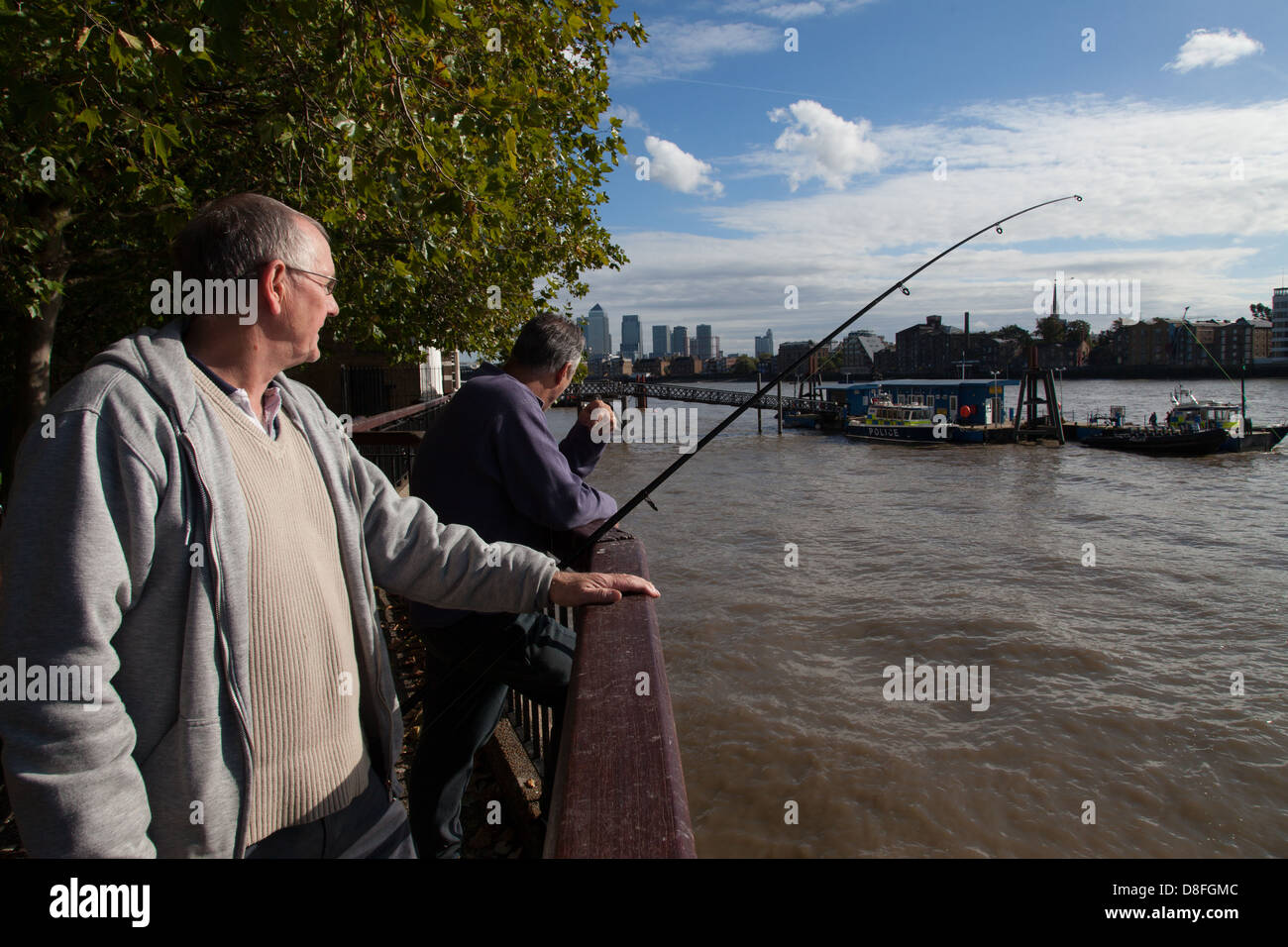 Two men eel fishing in River Thames, London Stock Photo Alamy