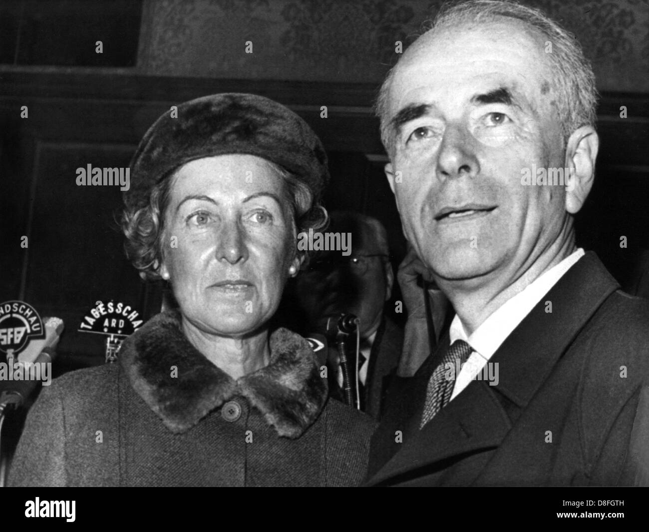 Albert Speer and his wife Margarethe during a short press conference in Berlin shortly after Speer's release from prison. The former National Socialist Minister of Armaments Albert Speer and Baldur von Schirach (not in the picture), hitler's governor of Wien, were released from the prison for war criminals in Berlin-Spandau on the 30th of September in 1966. They served their sentence of twenty years prison, to which they had been convicted during the Nuremberg Trials in 1946. Stock Photo