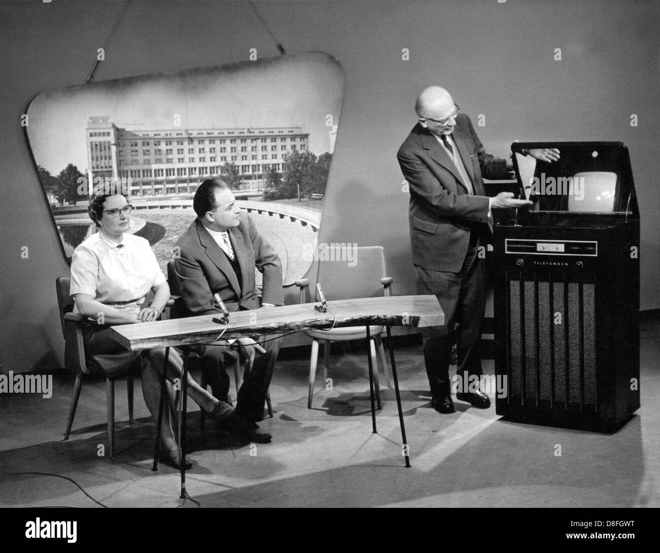 Professor Dr. Fritz Schröter (r) explains a new television device on the 22nd of March in 1960 during the anniversary broadcast on the occasion of the 25th anniversary of German television. Stock Photo