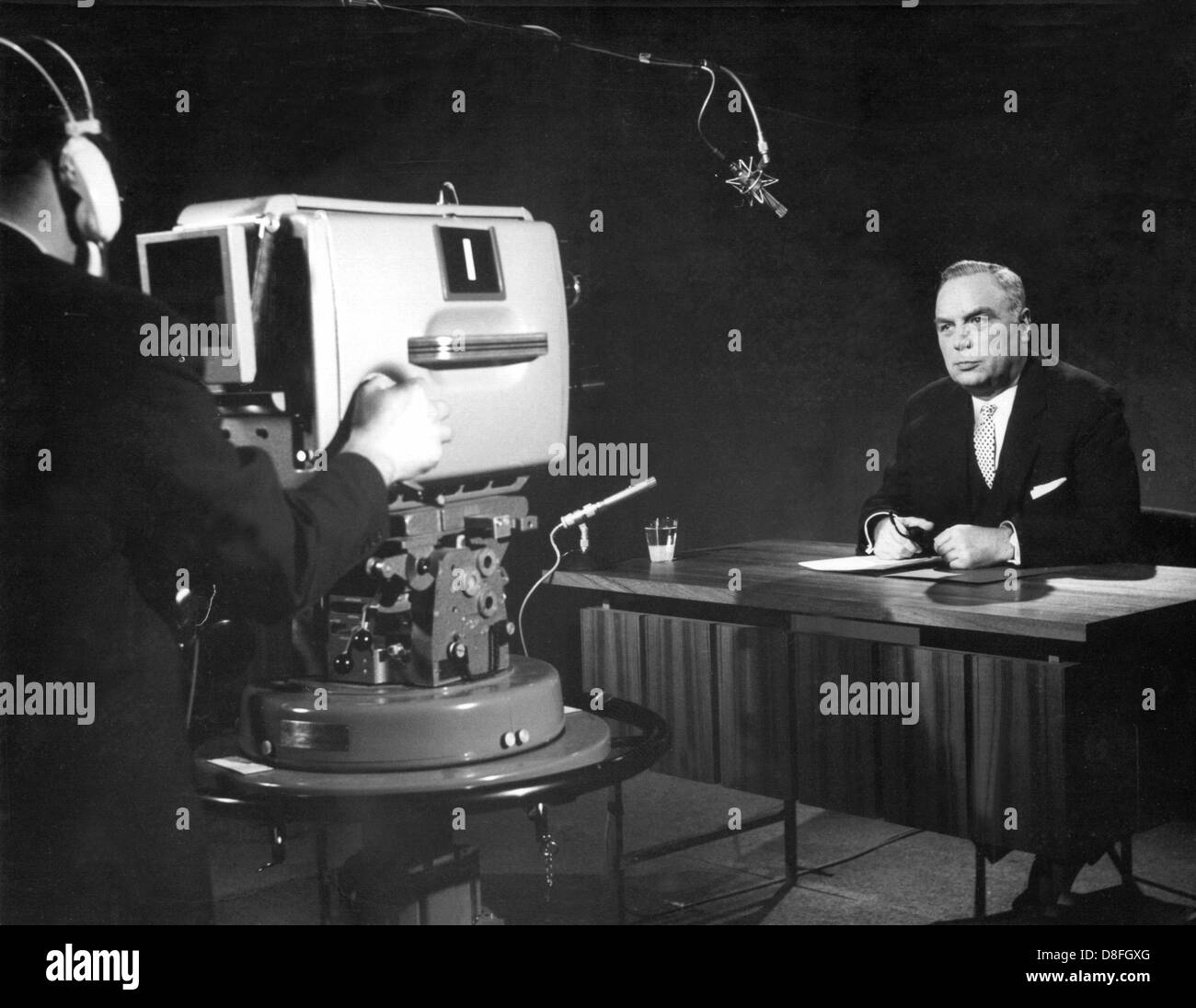 Director of the ZDF Professor Karl Holzamer gives a speech at the beginning of the broadcast. The 'Zweites Deutsches Fernsehen', the Second German Television or ZDF, started its programme on the 1st of April in 1963. Stock Photo