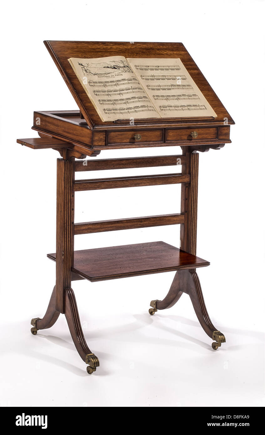 A Reproduction Of A Standing Tilt Top Desk Abstract On A White