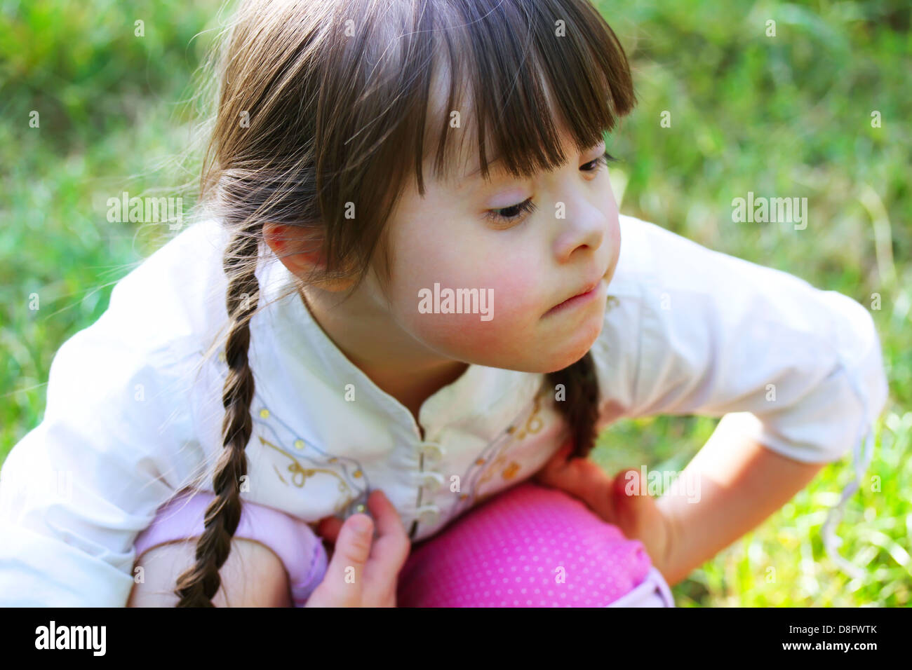 Portrait of beautiful young girl in the park Stock Photo - Alamy