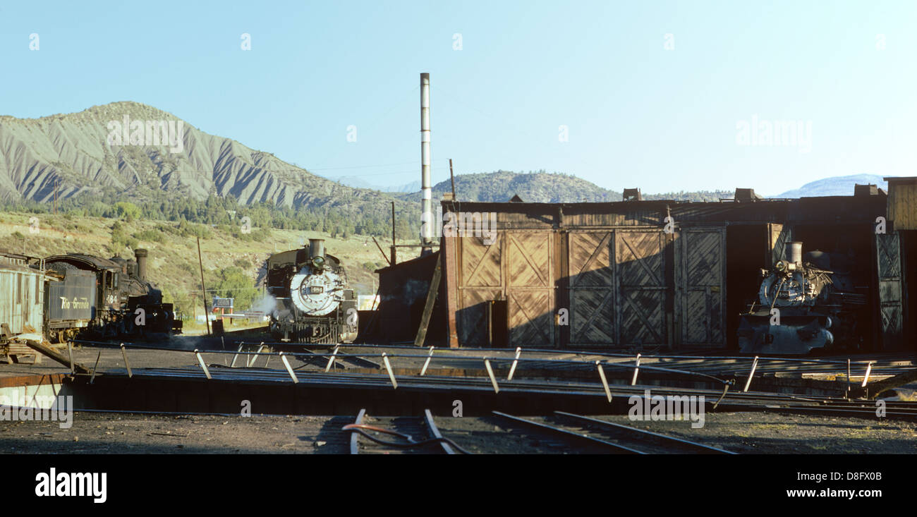 Engines 464, 484, and 488 (with snowplow), Turntable and Roundhouse, D&RGW Durango, CO 660907 001 Stock Photo