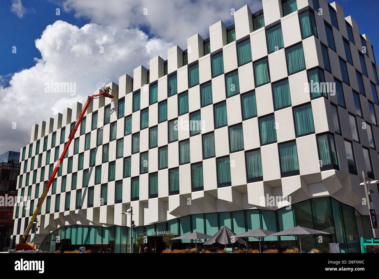 Cleaning the exterior of the Marker Hotel, Grand Canal Docks, Dublin