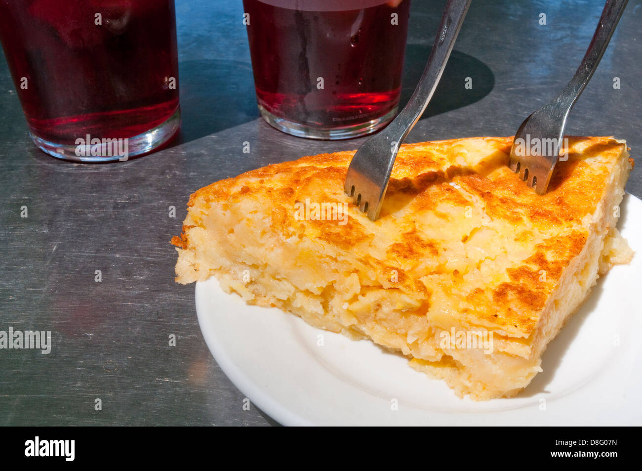 Spanish appetizer: Spanish omelette and tinto de verano in a terrace. Spain. Stock Photo