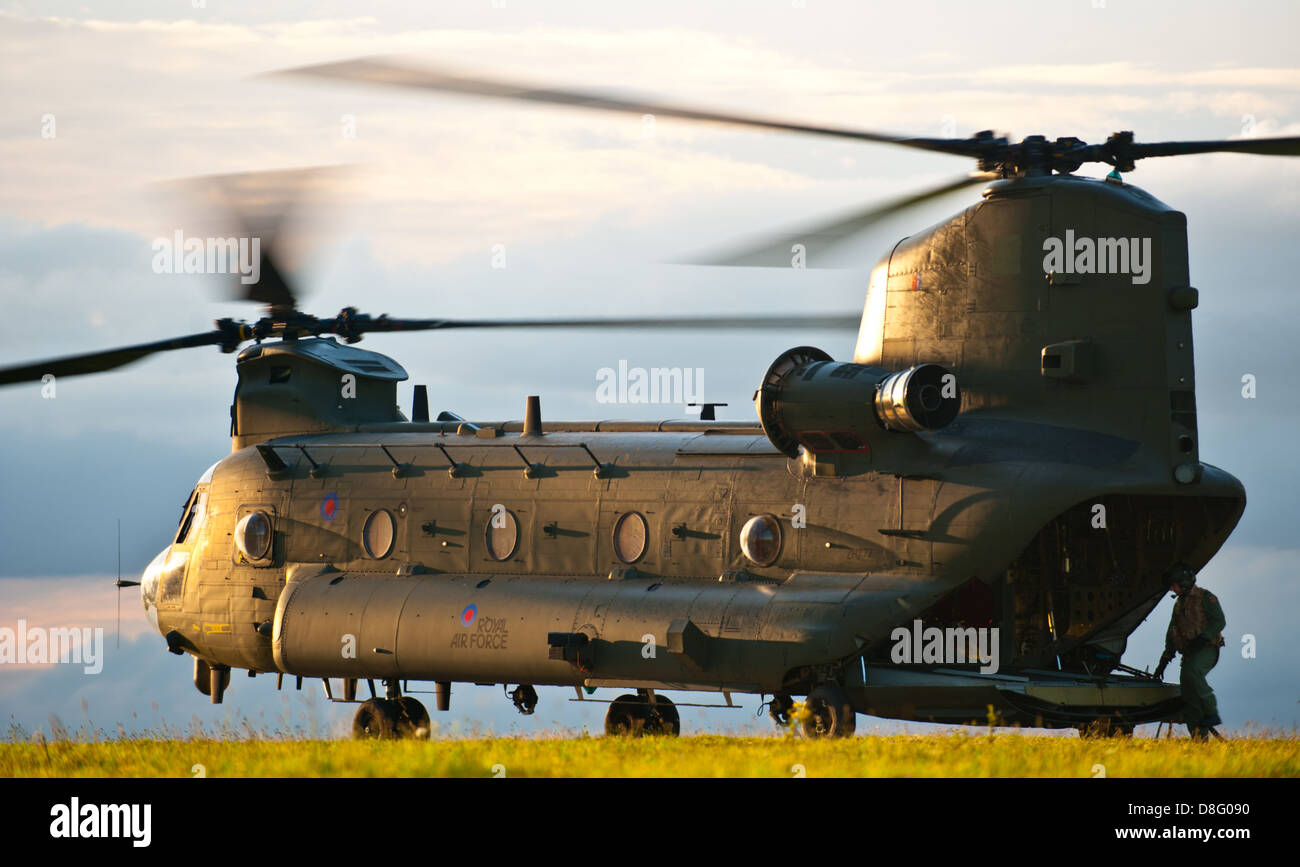 A Royal Air Force Chinook heavylift helicopter, prepares to depart after refuelling during an exercise Stock Photo