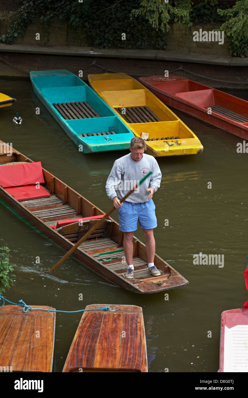 Coloured punts on the river Cherwell at Magdalen bridge at Oxford, Oxfordshire UK in May Stock Photo
