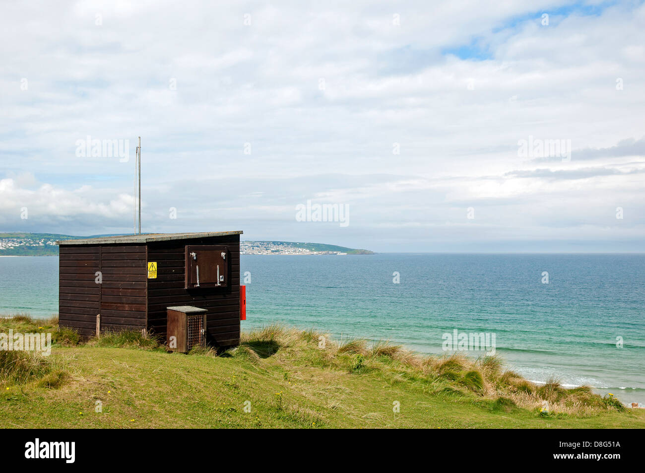 The lifeguards hut overlooking the beach at Gwithian in Cornwall, UK Stock Photo